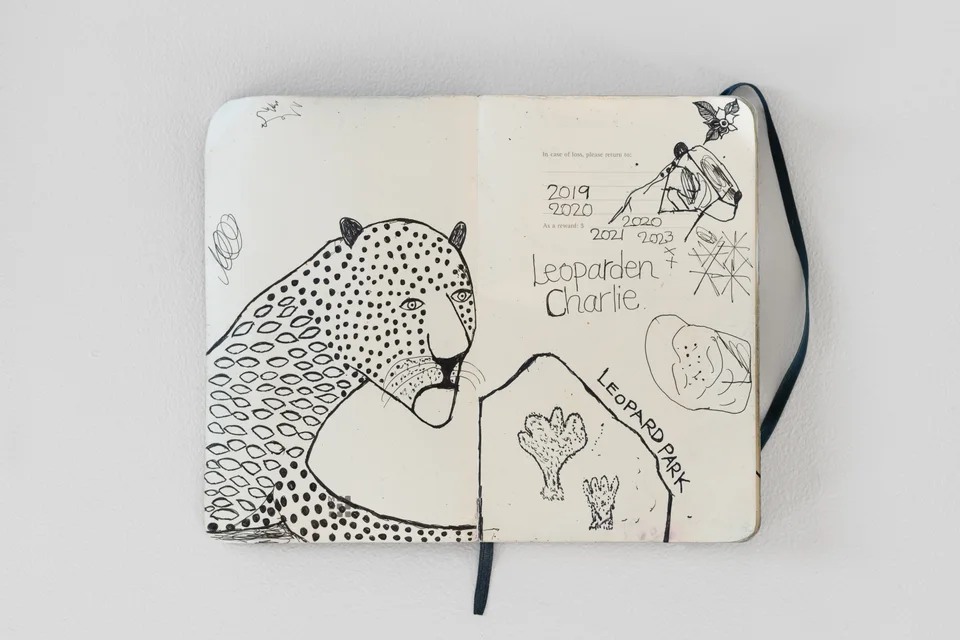 Open Leoparden Charlie notebook showing the context of the leopard painting
