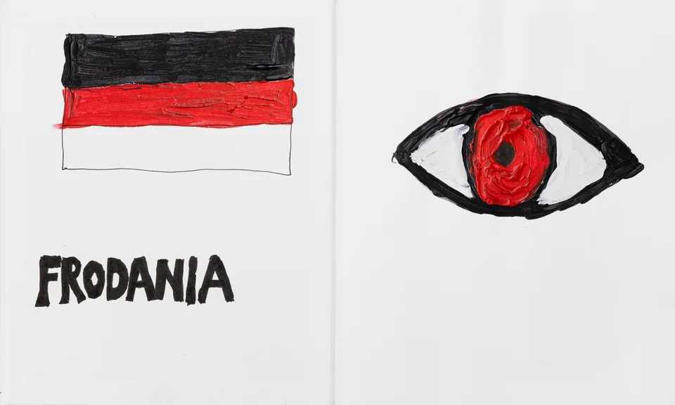 An open notebook showing a red-and-black flag, an eye, and the word FRODANIA.